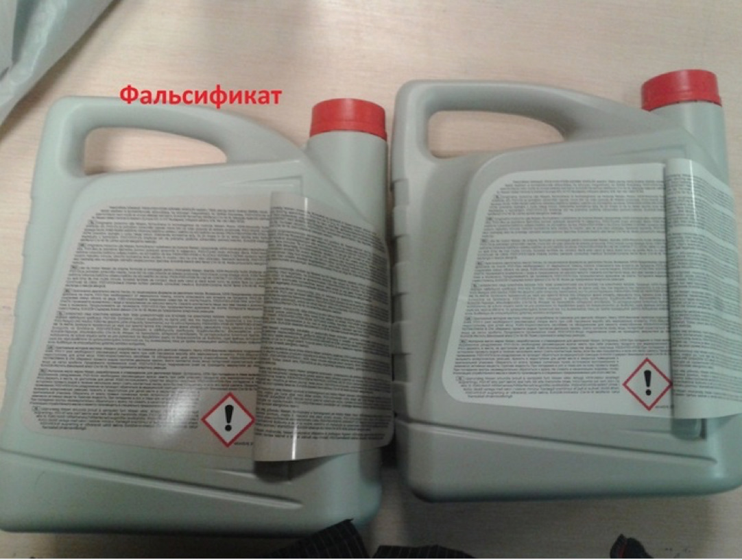 Проверка задней наклейки на канистре моторного масла Nissan 5W-40 Наклейка Nissan 5W-40
